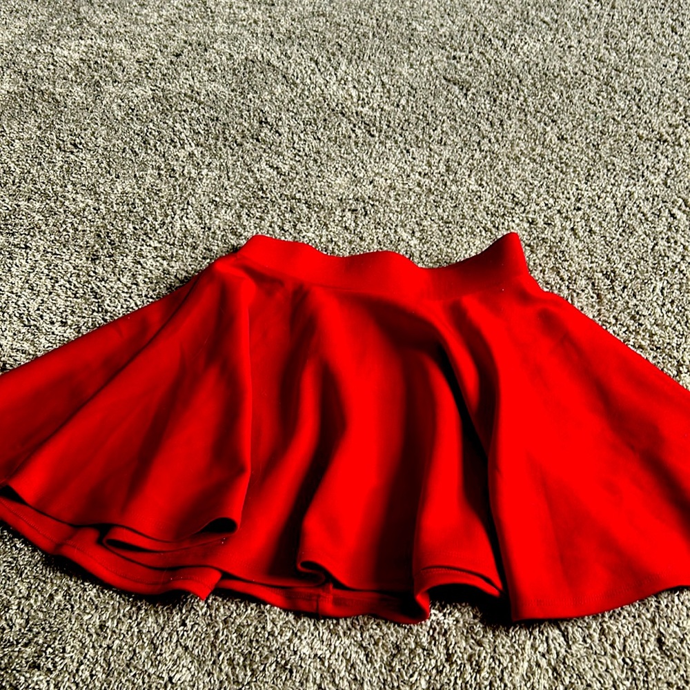 I’m selling a bright red tennis skirt